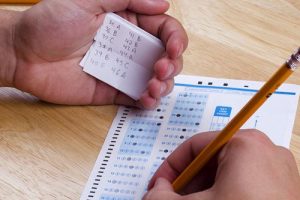قانون تفسیر ماده ۱۱ قانون رسیدگی به تخلفات و جرایم در آزمونهای سراسری